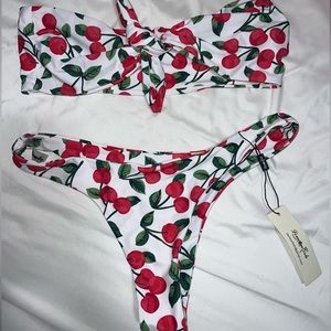 NWT cheeky/thong cherry patterned swimsuit